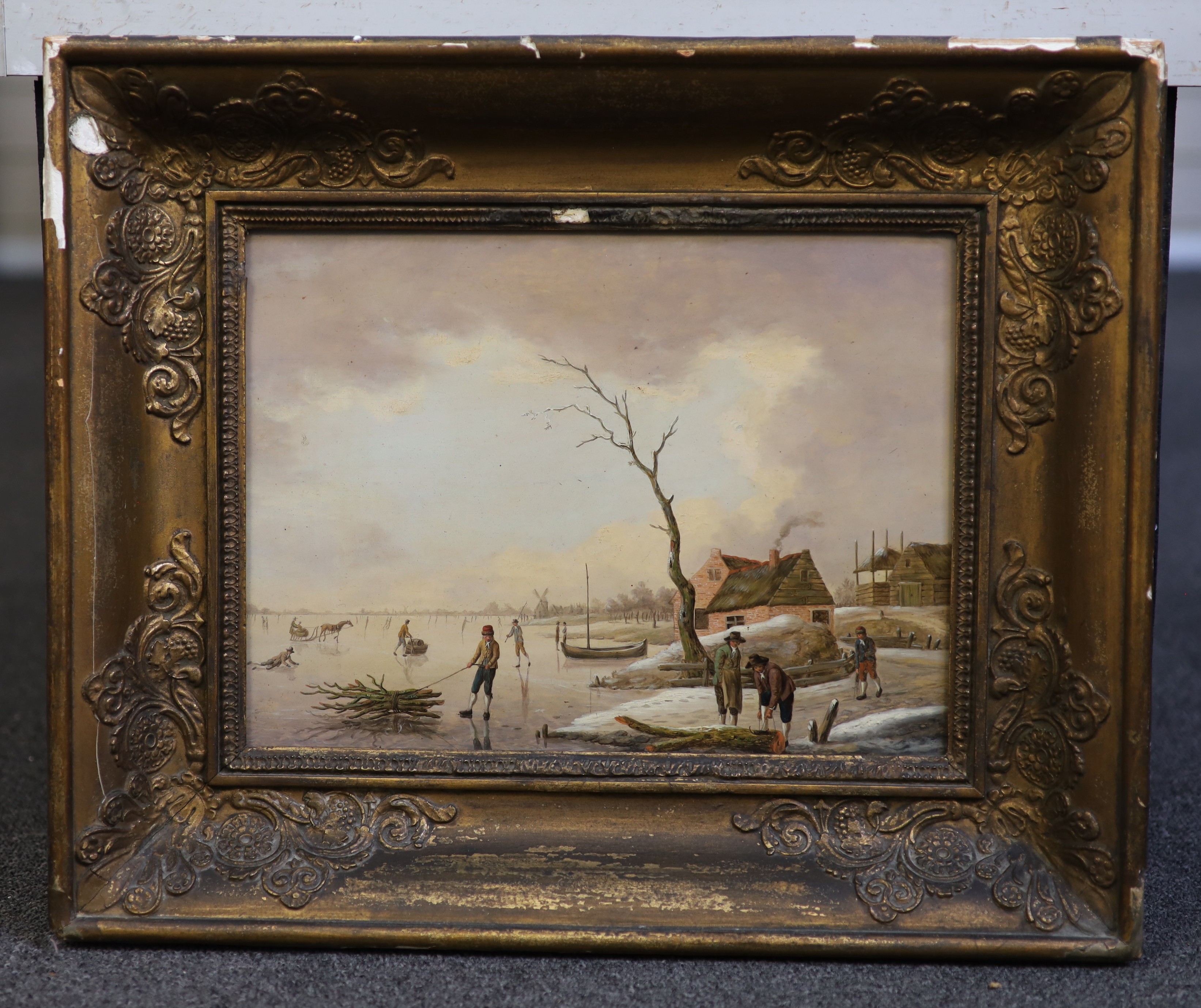 Attributed to Hendrik Willem Schweickhardt (German, 1746-1797), Winter landscape with skaters on the ice, oil on wooden panel, 23 x 31cm